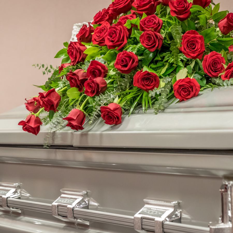 Red rose casket spray